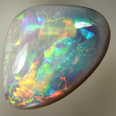 SOLID SEMI BLACK OPAL Rolling flashes of crispy bright fire 